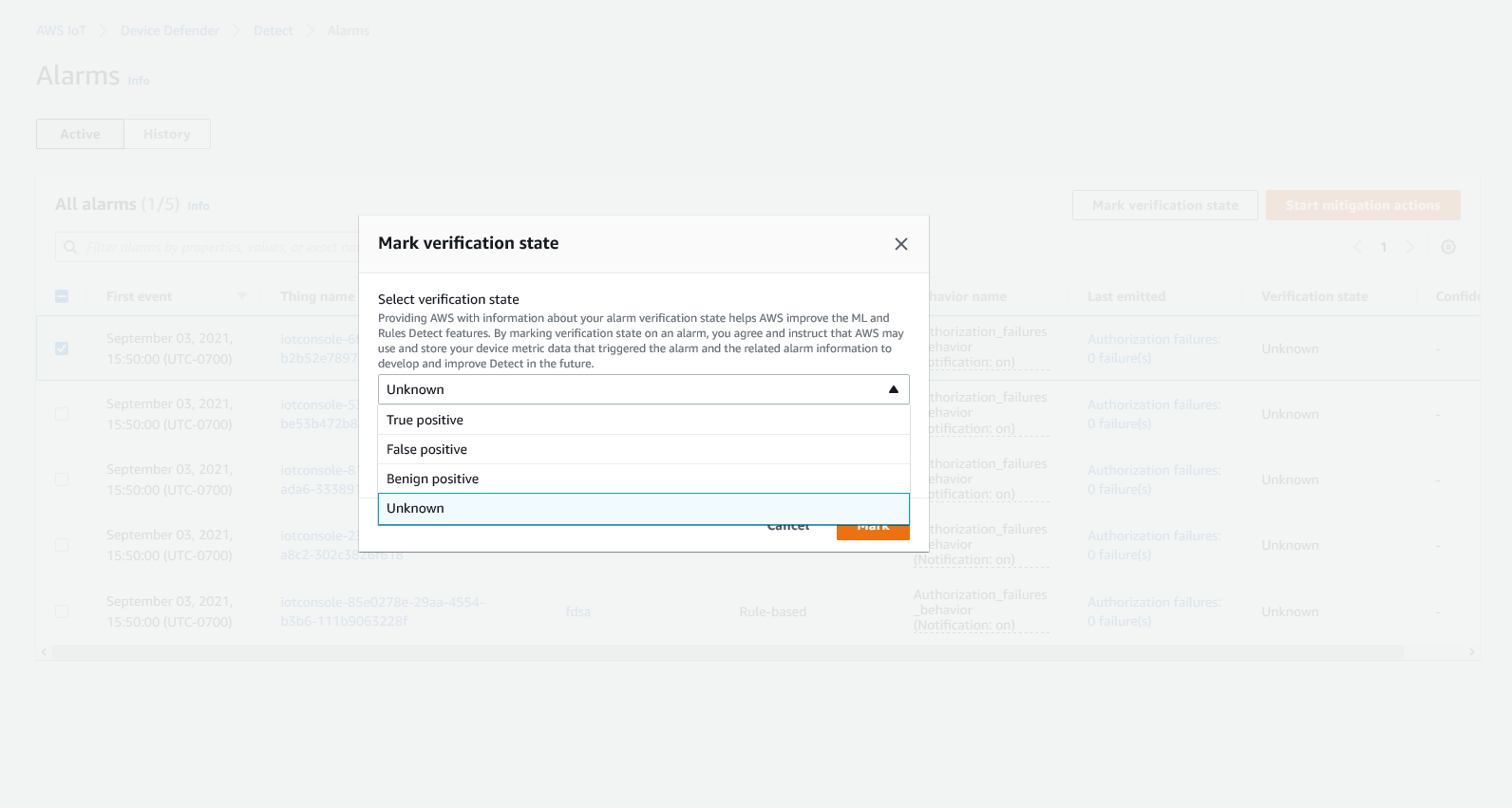 Dialog to mark alarm verification state with options: Unknown, True positive, False positive, Benign positive.